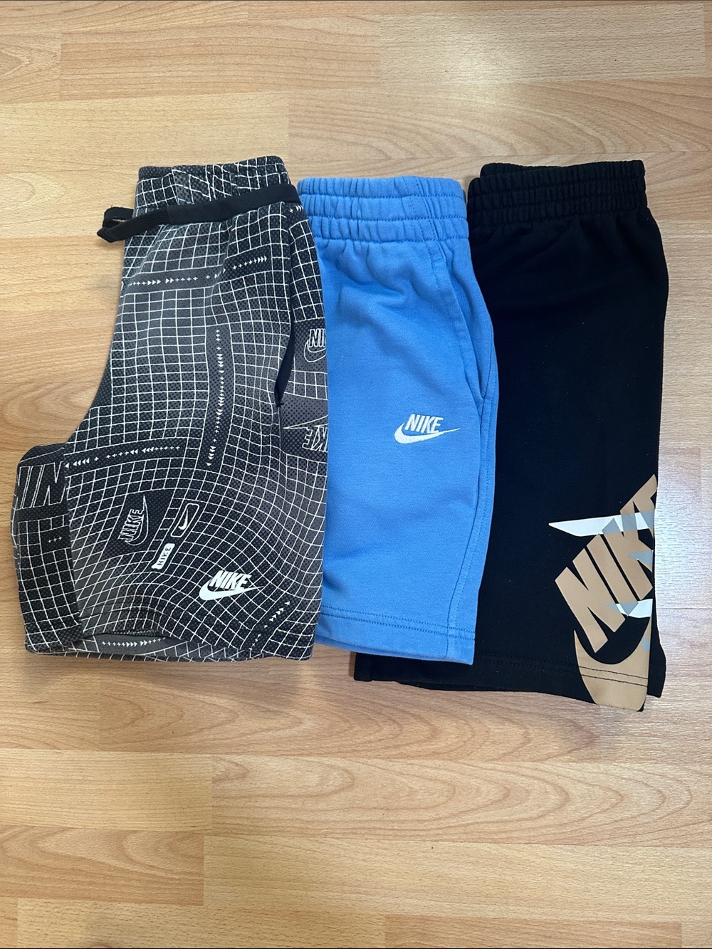 Nike Kids 3-Pack Shorts — Black, Blue, Patterned Gray 3 for $45
